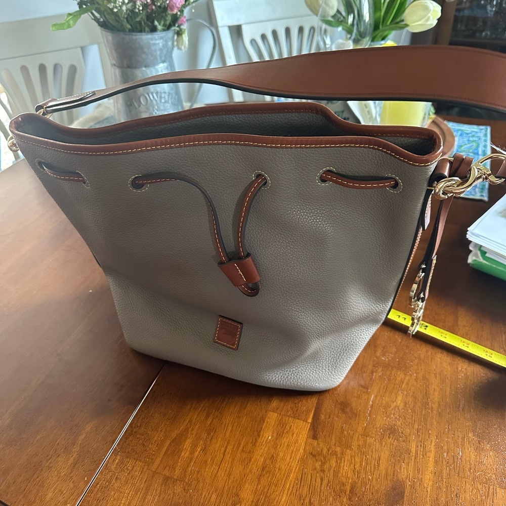 Dooney and Bourke pebble grain drawstring bag